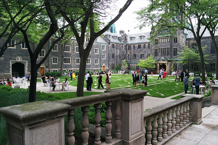 people walking on a college campus