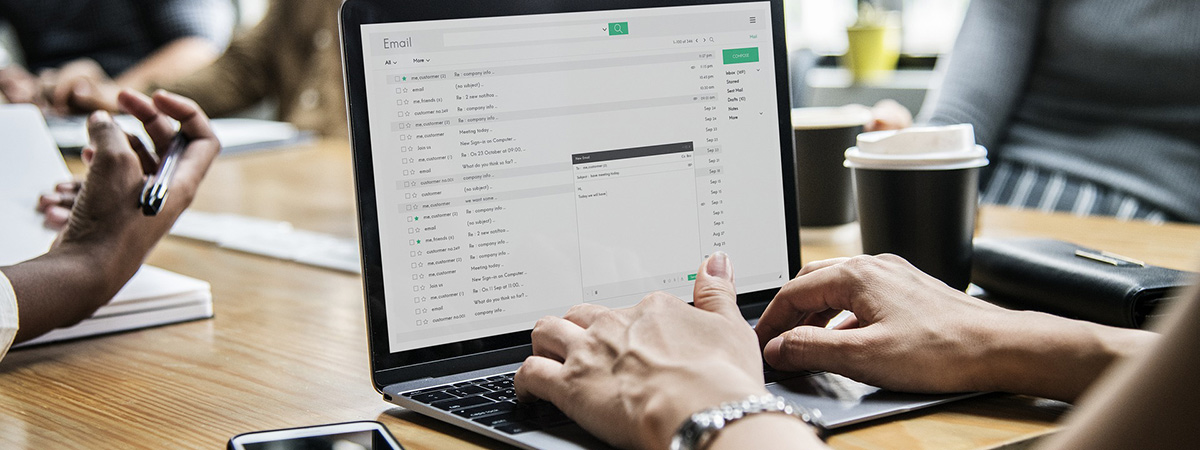 person on a computer looking at email